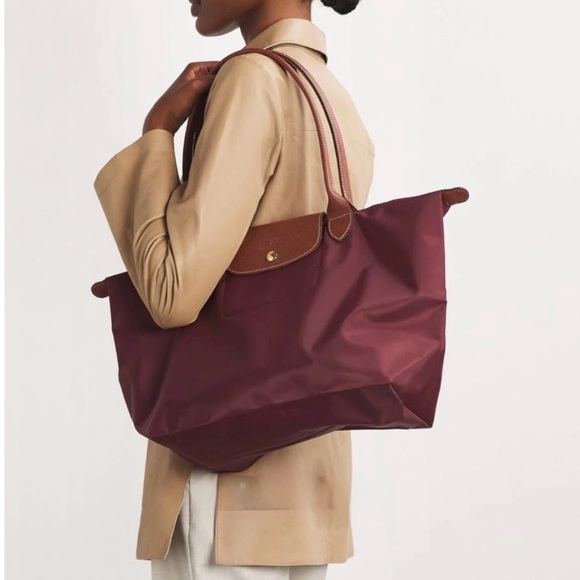 Longchamp Handbags - Longchamp
Large Le Pliage Original Tote Bag Elegant Burgundy  preowned  $185